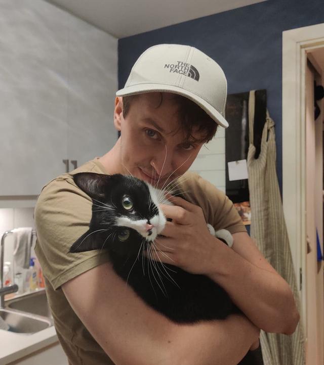 Employee with his cat named Lusk